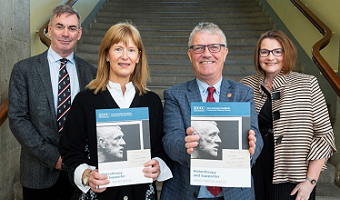 group of people launching the latest impact report